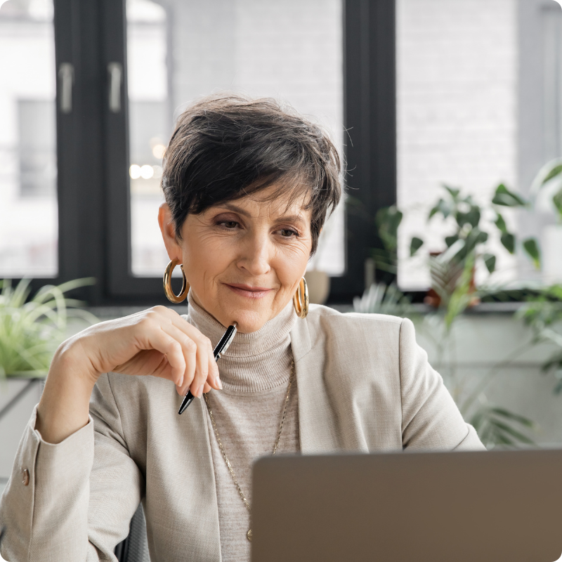 Happy woman working on computer